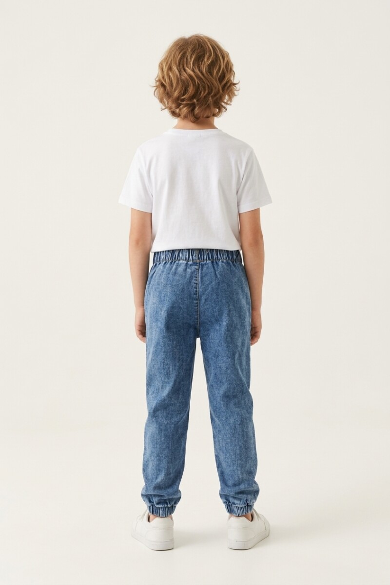 Jogger de jean con cortes JEAN MEDIO