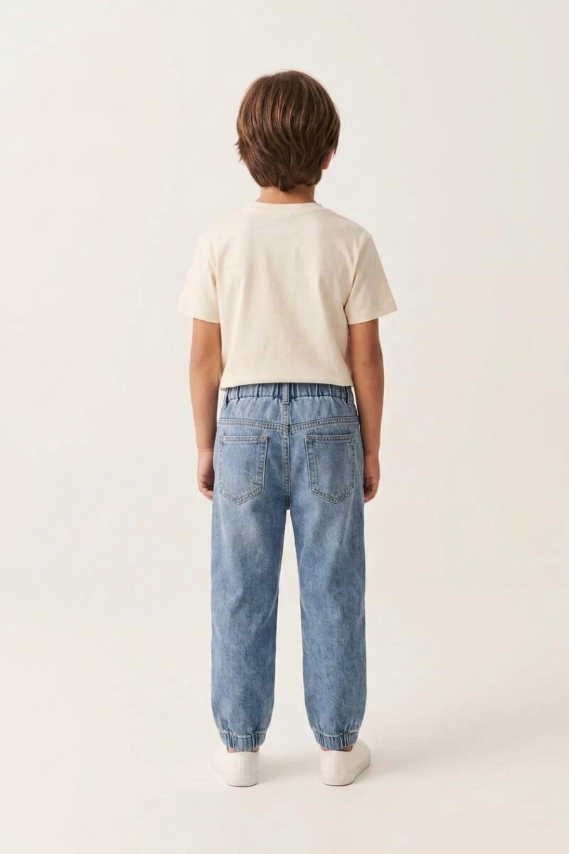 Jogger de jean con cortes JEAN MEDIO