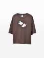 REMERA BROKEN M&M MARRON OSCURO