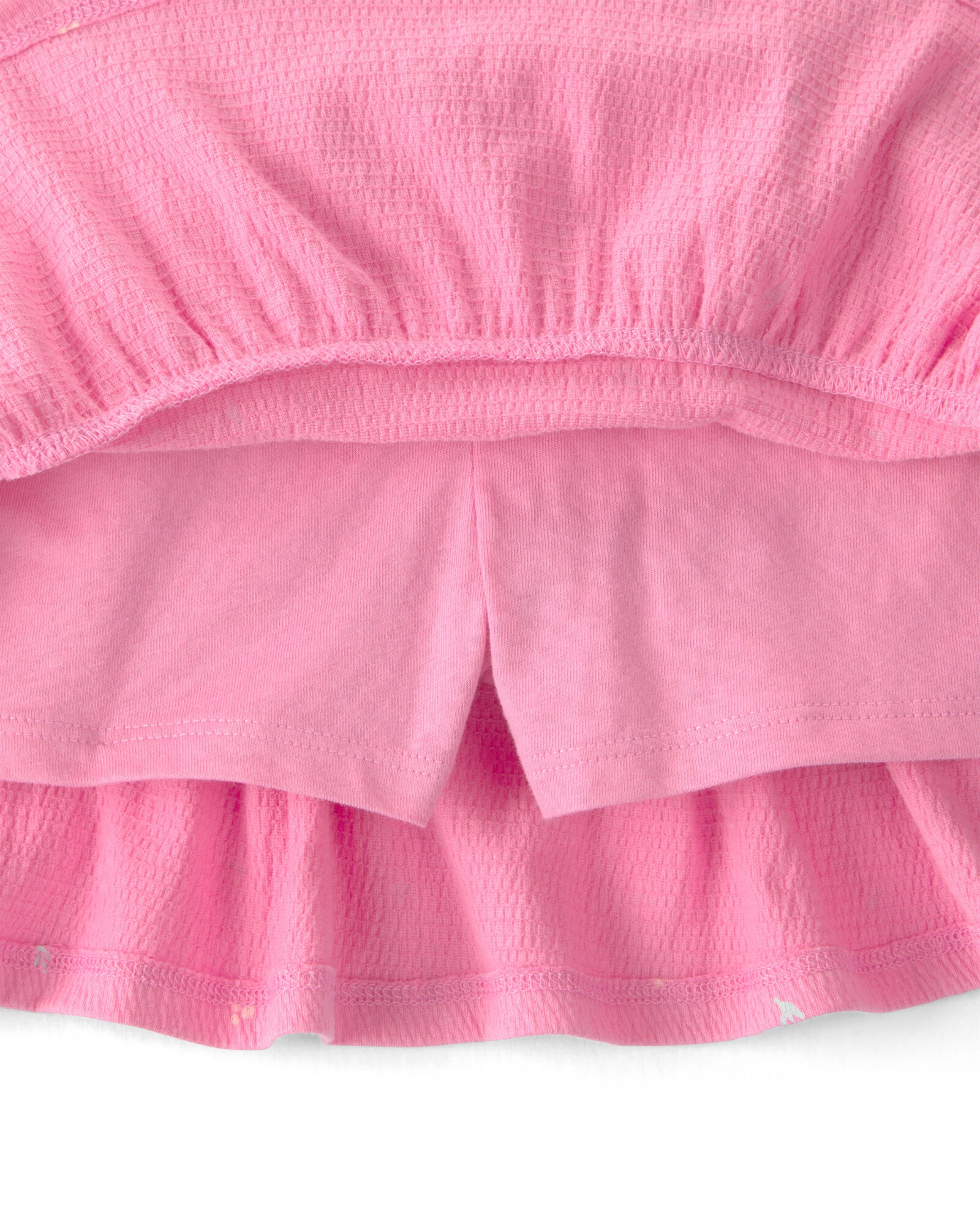 Set dos piezas, short pollera de jersey arrugado y remera de algodón, rosado, diseño floral Sin color