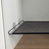Estante extensible con 4 enganches adhesivos 50/85x35x3cm