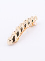 BROCHE DORADO