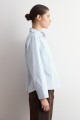 Blusa cuello camisa celeste