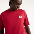 Remera New Balance de Hombre - Woven Label - MT53928PDR RED