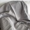 Manta tejida para sillón y cama gris 180 x 130 cm