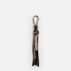 Llavero charm Candy en combinación de cordones Negro
