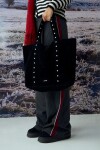 Shopper suede con tachas negro