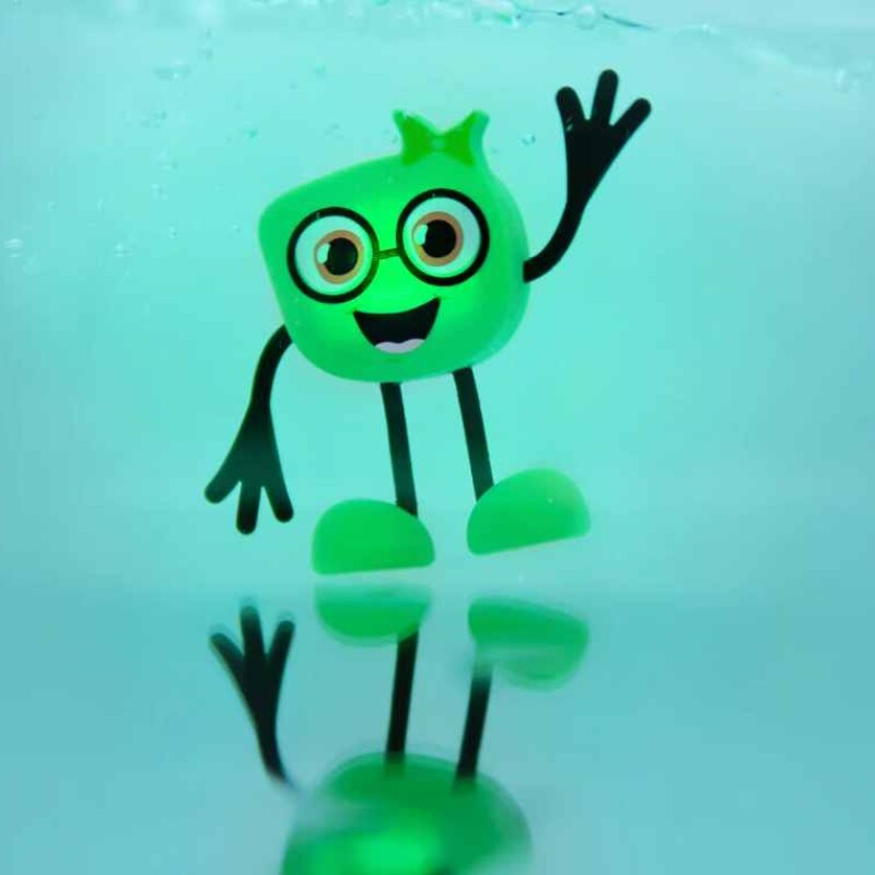 Glo Pals Set personaje + 2 cubos iluminados Verde