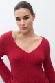 Sweater con lazo rojo