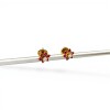 Caravanas Flor de Rubí de oro- Oro bajo - Rubí y zirconia- CA8122 conpiedra