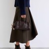 Cartera de mano Call en efecto cuero liso Marron