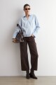 Blusa cuello camisa celeste
