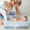 Baño Stokke Flexibath Plegable Transparente y Celeste