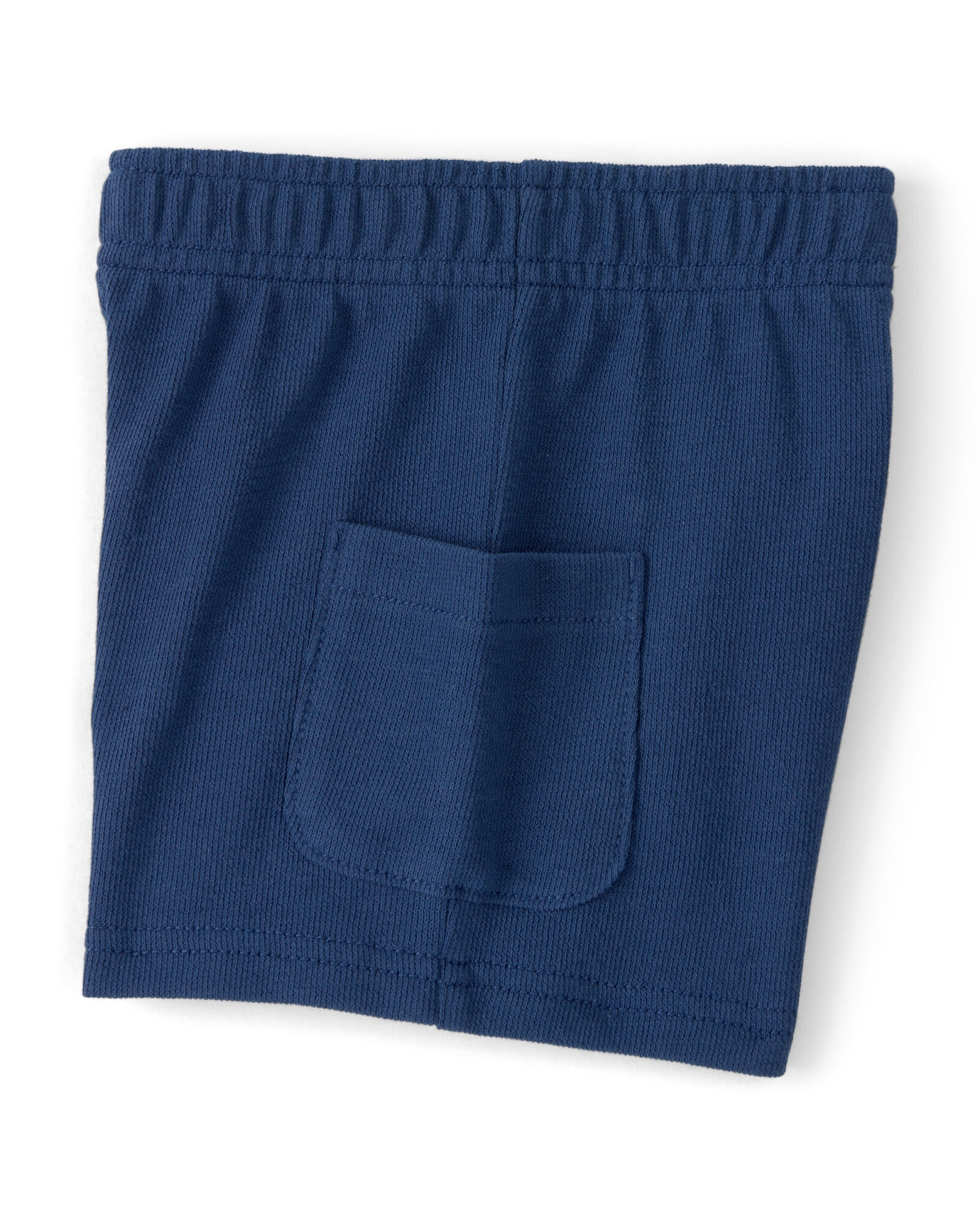 Set dos piezas de algodón, short y remera, azul marino, auto bordado. Talles 2-5T Sin color