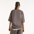 Remera New Balance de Dama - Tracklside - WT6297MKBLK DARK GREY