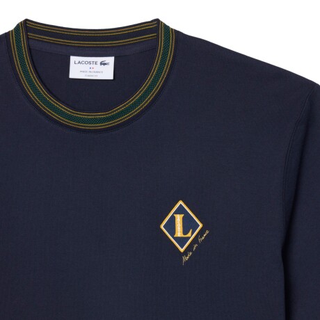 Remera Lacoste Made in France con Insignia MXQ