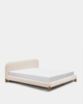 Cama desenfundable Odina bouclé crudo y patas de madera maciza de fresno acabado tono nogal para colchón de 180 x 200 cm