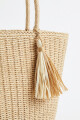 Bolso tejido beige