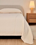 Cama desenfundable Odina bouclé crudo y patas de madera maciza de fresno acabado tono natural para colchón de 180 x 200 cm.