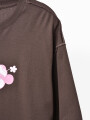 REMERA BROKEN M&M MARRON OSCURO
