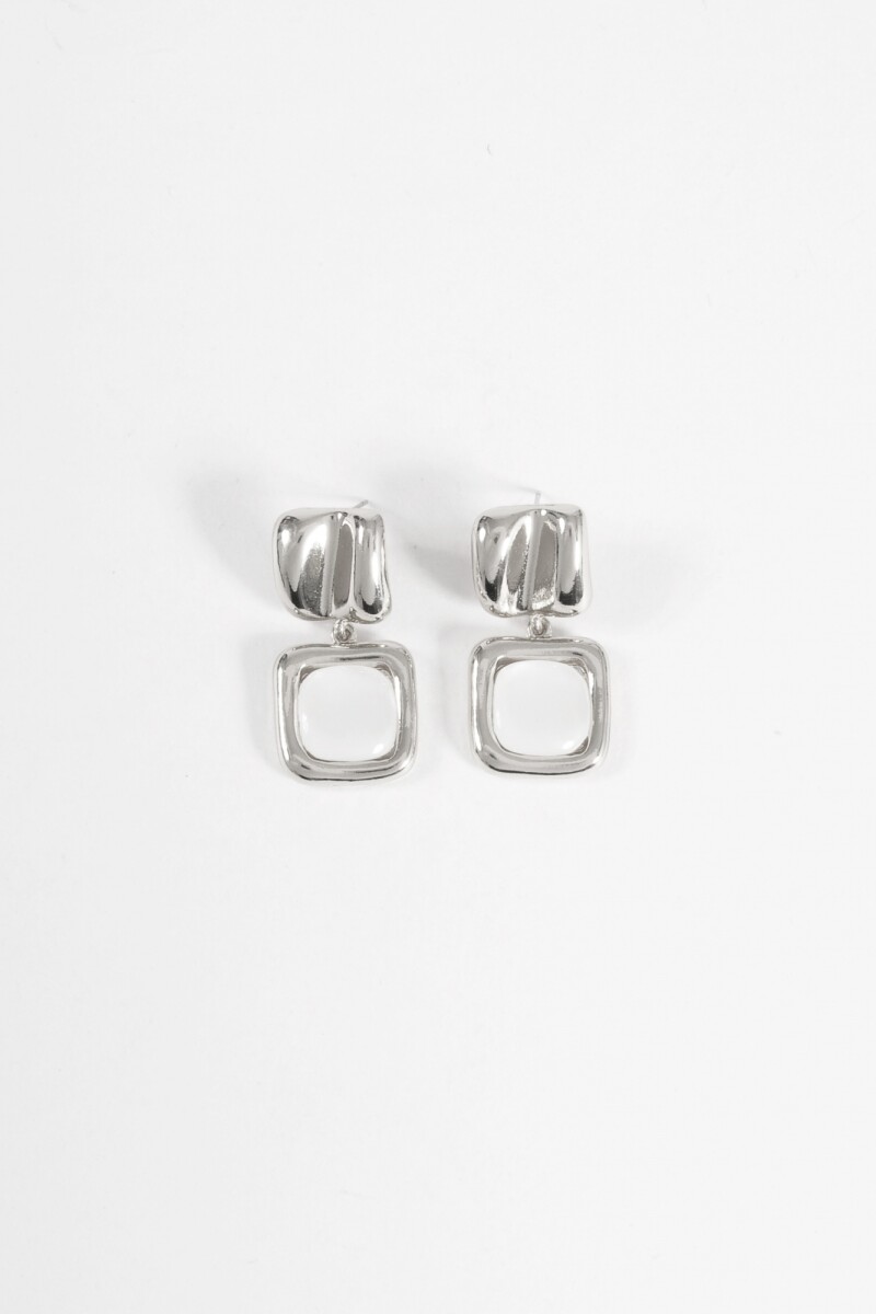 Caravanas metálicas dije nacarado plateado