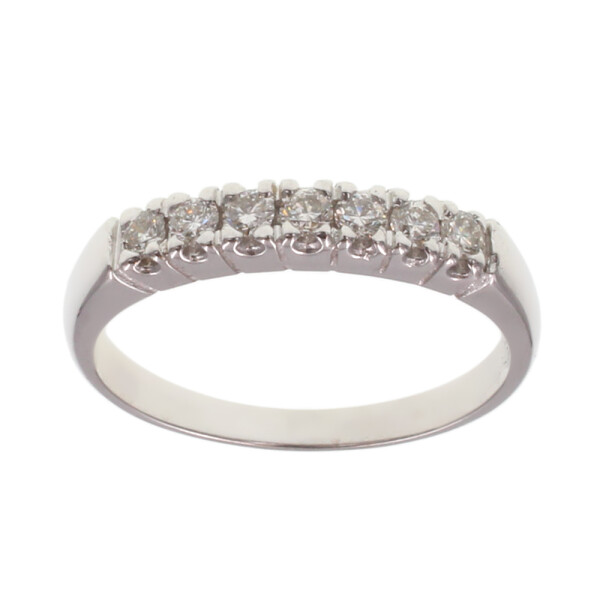 Anillo medio sin fin clásico en oro blanco 18k con siete brillantes Anillo medio sin fin clásico en oro blanco 18k con siete brillantes