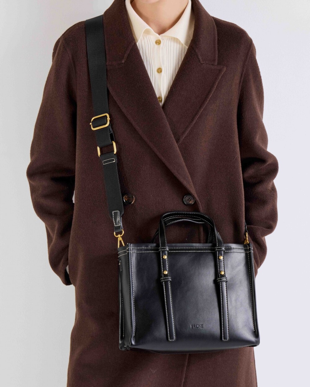 Cartera de mano Louise en efecto cuero liso Negro