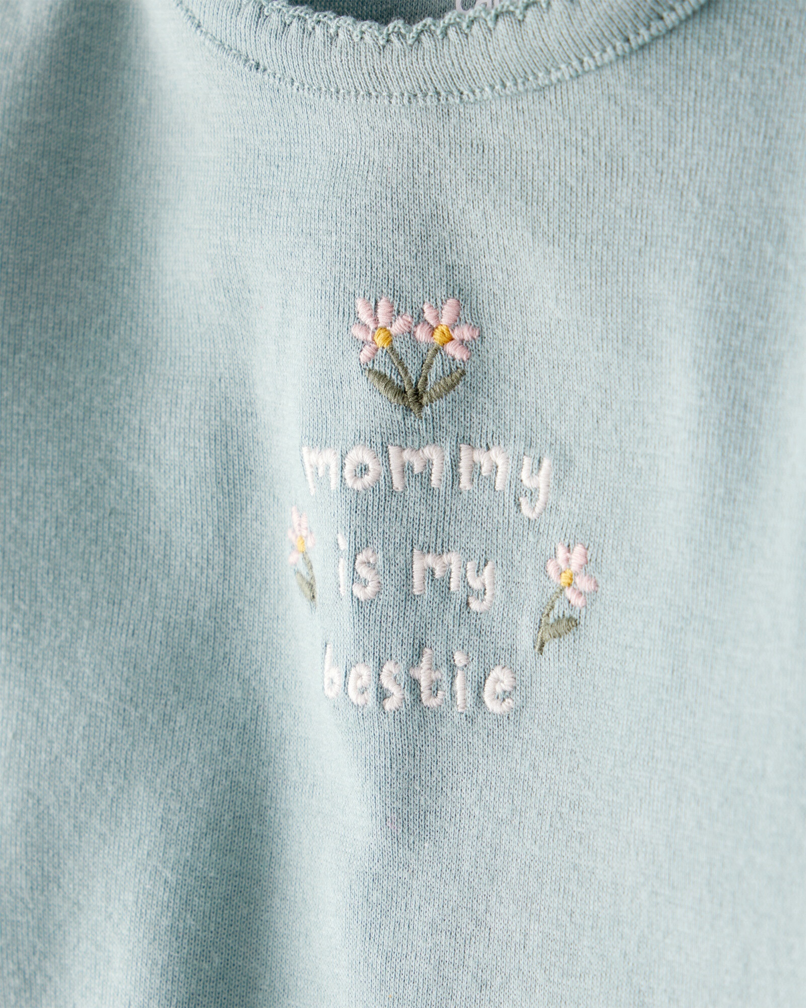 Set dos piezas de algodón, pantalón y body, diseño floral Set dos piezas de algodón, pantalón y body, diseño floral