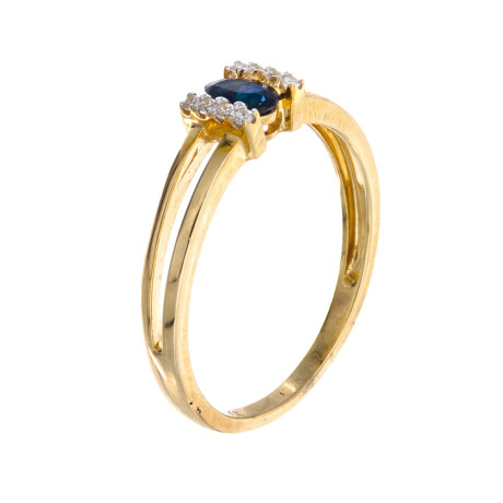 Anillo de oro 9 ktes con zafiro azul natural y circonias. Anillo de oro 9 ktes con zafiro azul natural y circonias.