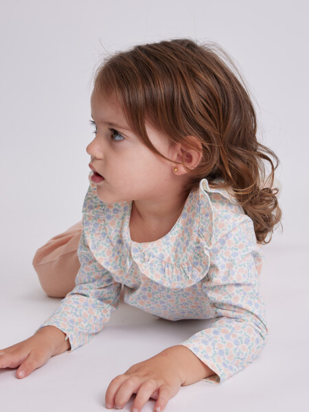 Remera manga larga cuello Flores Crema