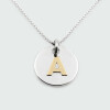 Colgante medalla mediana de plata 925 con letra de oro 18k (incluye cadena) Colgante medalla mediana de plata 925 con letra de oro 18k (incluye cadena)