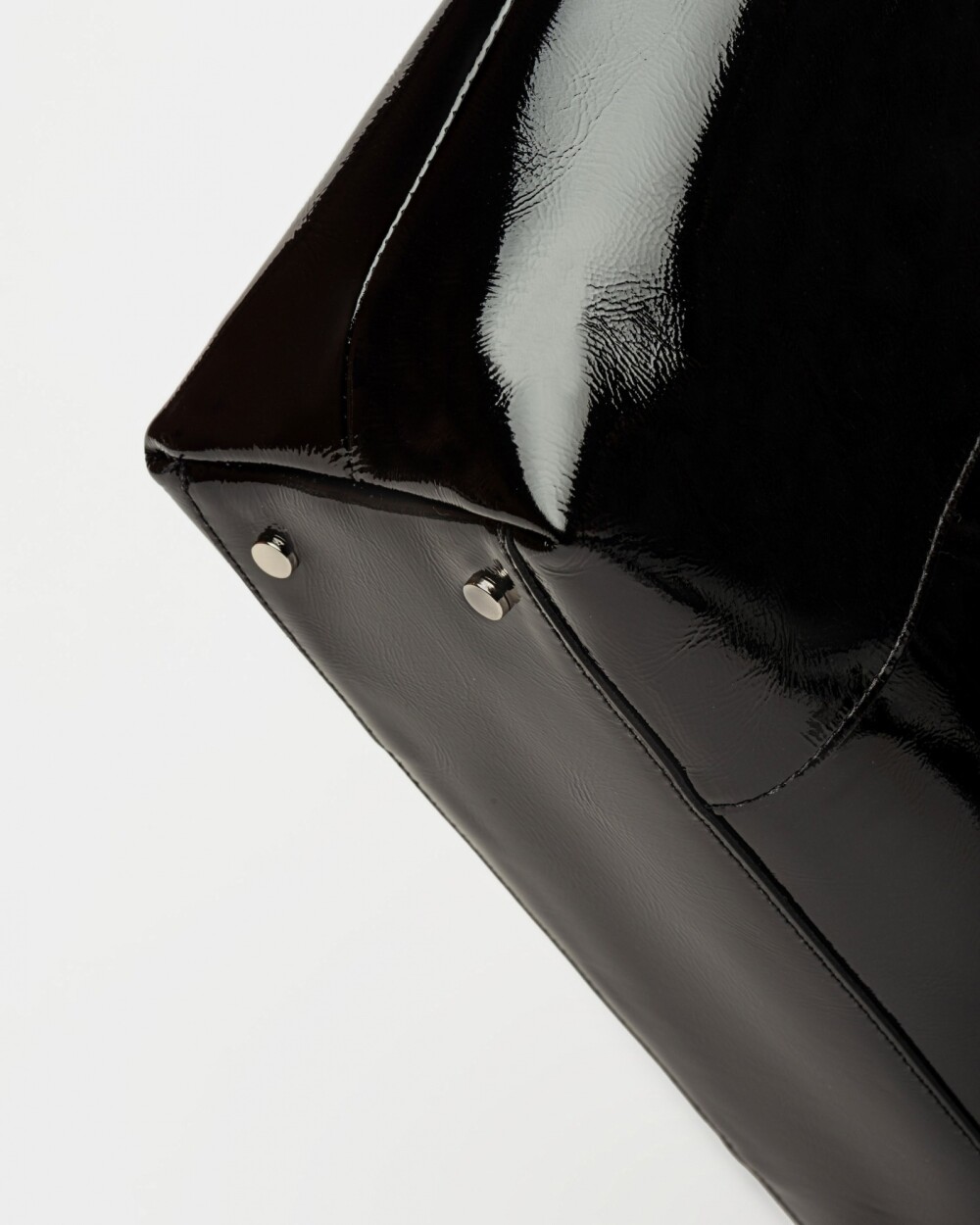 Bolso The Icon en cuero charol arrugado Negro