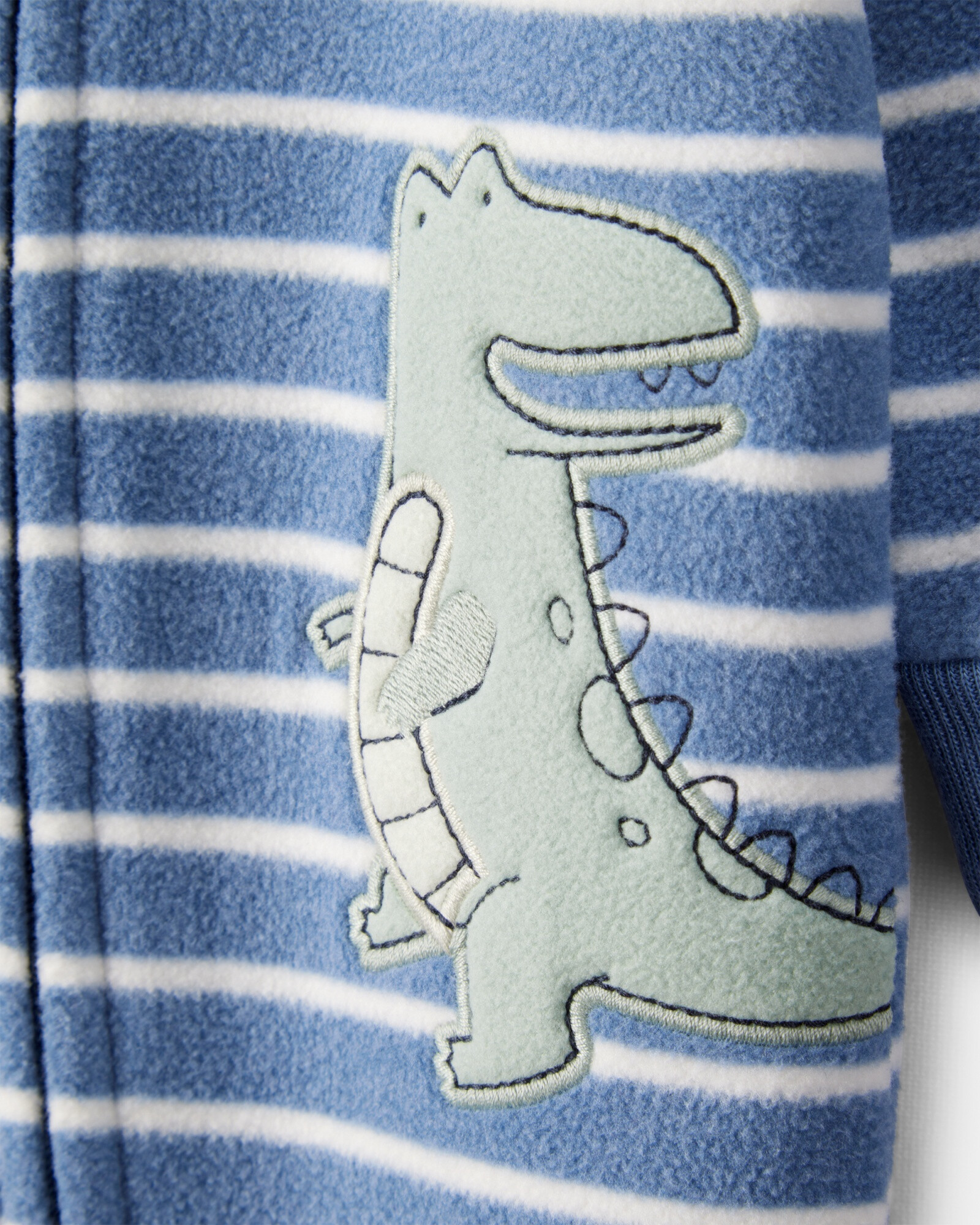 Pijama una pieza de micropolar, con pie, estampa dino Sin color