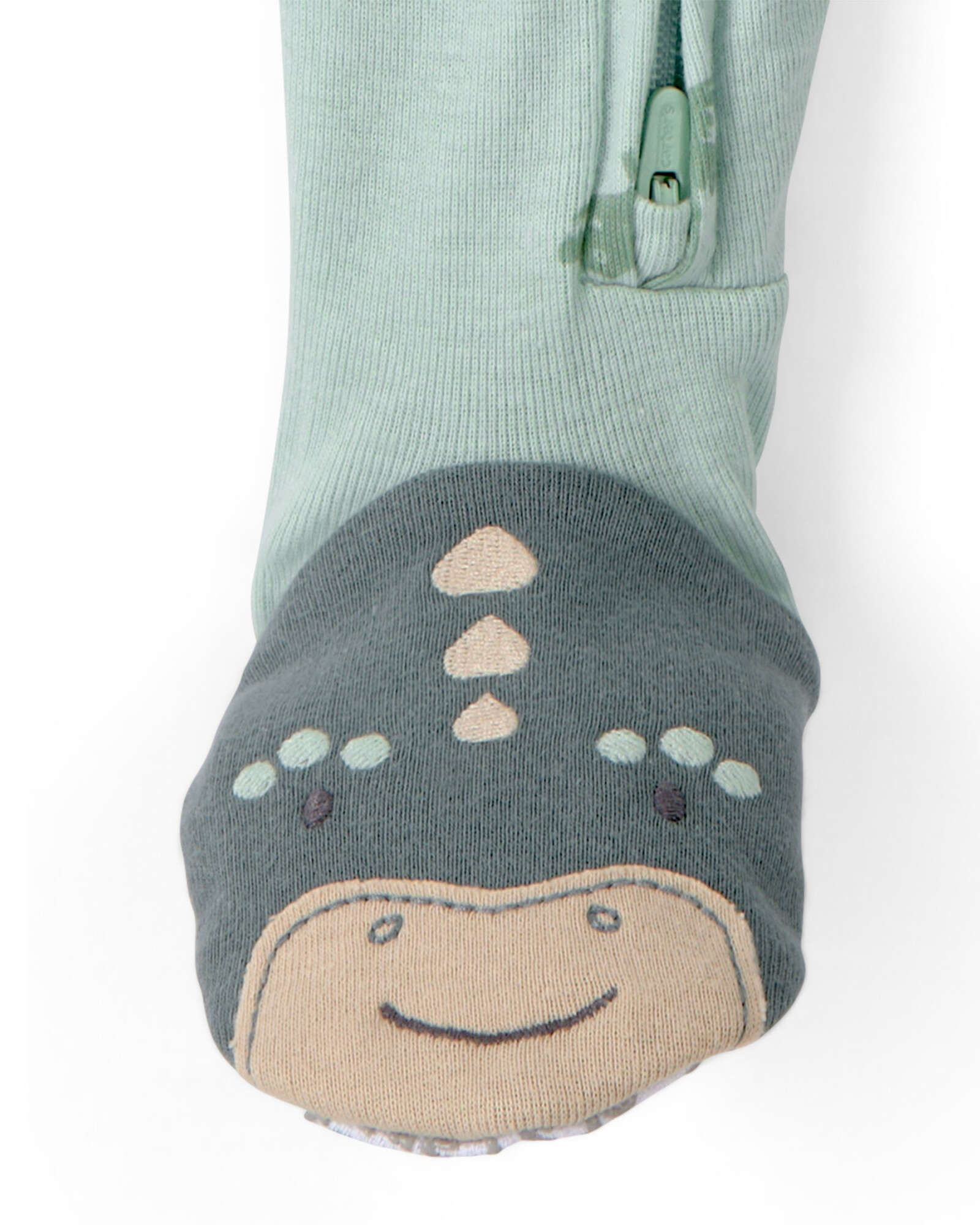 Pijama enterito de algodón con pie, verde, diseño dinos. Talles 12-24M Sin color