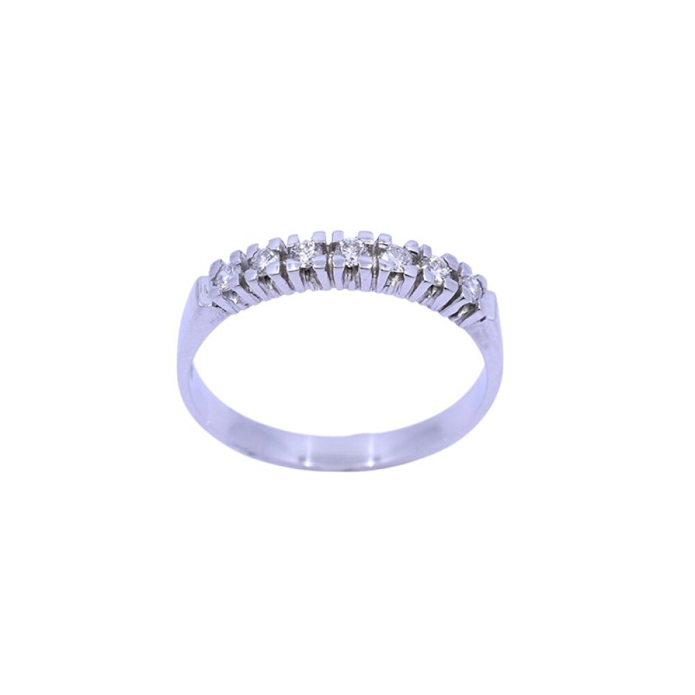 Anillo medio sin fin oro blanco 18 k con 7 brillantes engarce 4 puntas. Anillo medio sin fin oro blanco 18 k con 7 brillantes engarce 4 puntas.