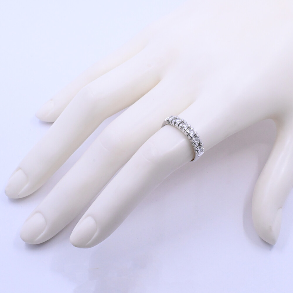 Anillo medio sin fin oro 18k blanco con brillantes engarce 4 puntas Anillo medio sin fin oro 18k blanco con brillantes engarce 4 puntas