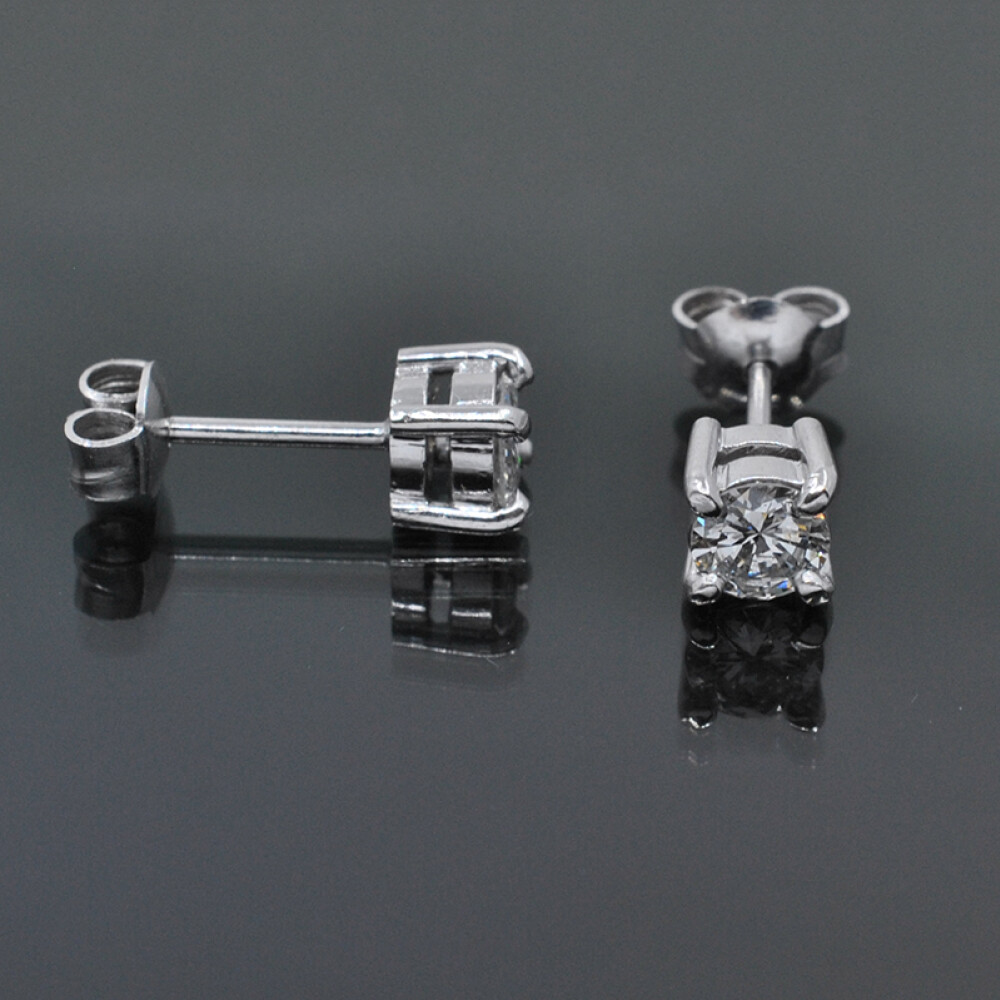 Caravanas en oro 18k blanco y brillantes Caravanas en oro 18k blanco y brillantes