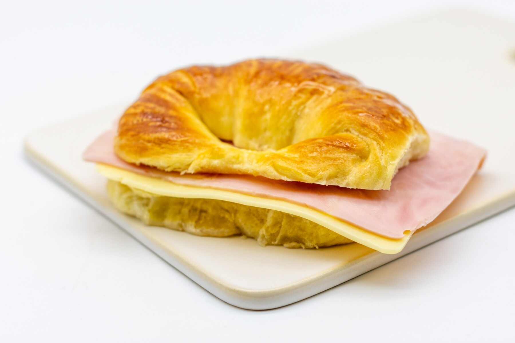 Medialuna con Jamón y Queso - 000 