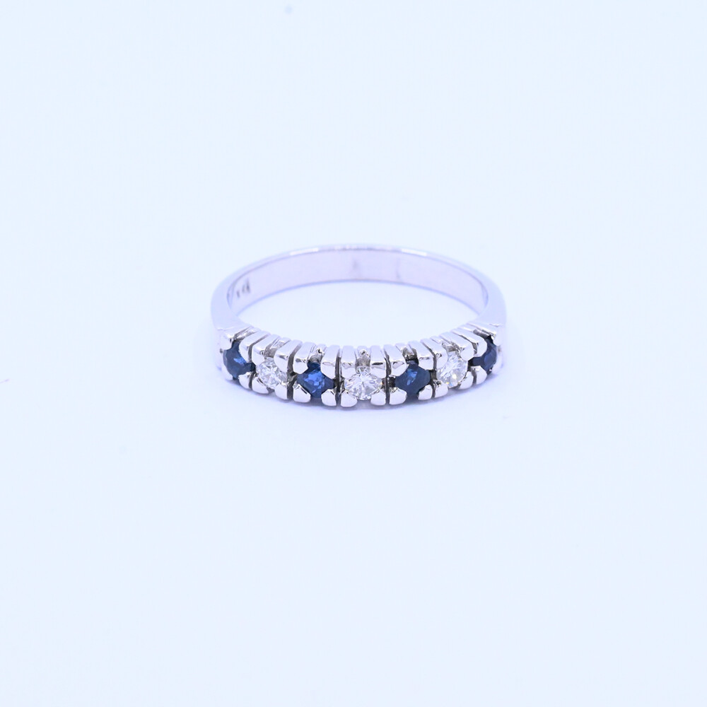 Anillo medio sin fin oro 18k blanco con zafiros y brillantes. Anillo medio sin fin oro 18k blanco con zafiros y brillantes.