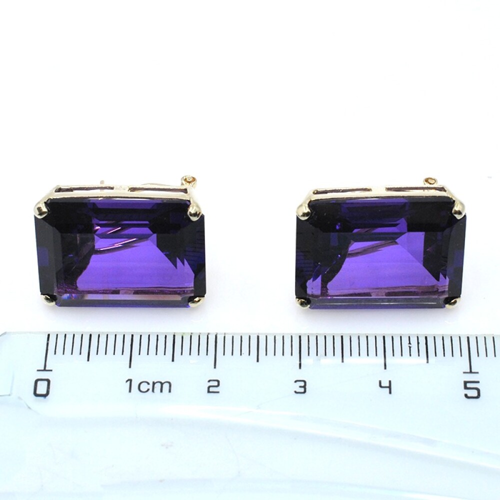 Caravanas clips en oro 14k con amatistas 0,30 ct aprox. Caravanas clips en oro 14k con amatistas 0,30 ct aprox.