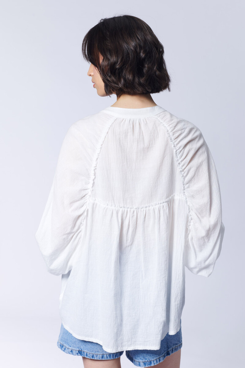 Blusa Cortes Cruda