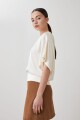 Blusa satinada beige