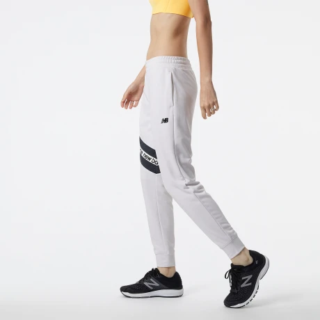 Pantalón New Balance de Dama RELENTLESS TERRY - WP21180SST WHITE