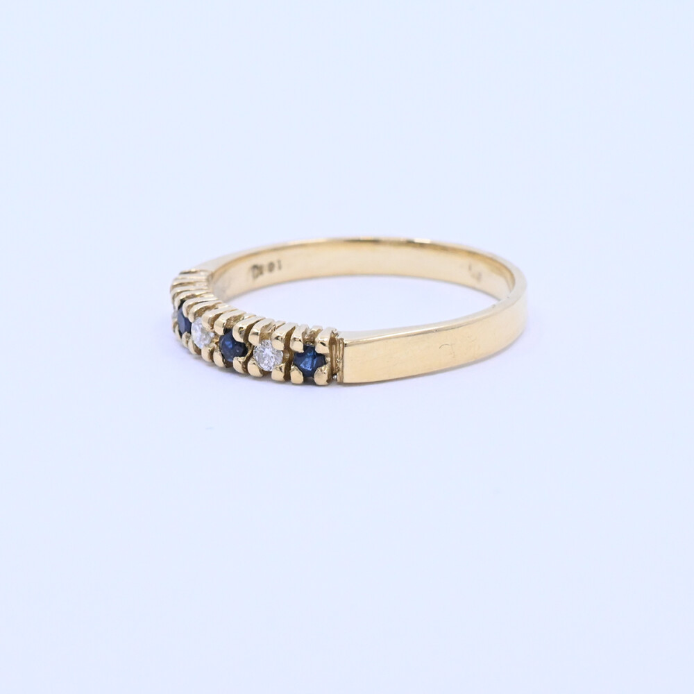 Anillo medio sin fin oro 18k amarillo con 4 zafiros y 3 brillantes. Anillo medio sin fin oro 18k amarillo con 4 zafiros y 3 brillantes.