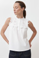 Top con broderie y volados blanco