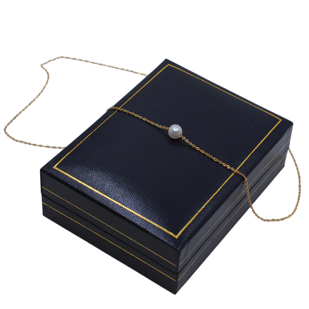 Cadena en oro 18k tipo singapour y perla de cultivo Cadena en oro 18k tipo singapour y perla de cultivo