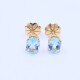Caravanas oro 18k con topacios celestes oval. Caravanas oro 18k con topacios celestes oval.