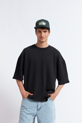 REMERA STONE NEGRO