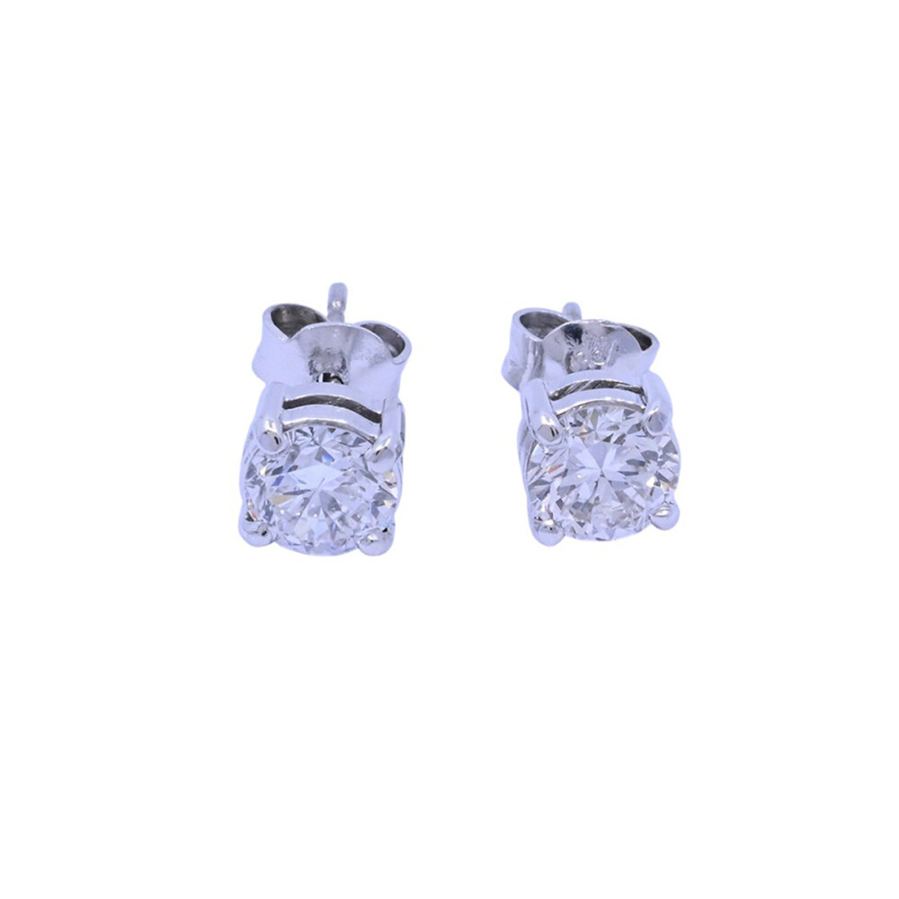 Caravanas oro 18k blanco con engarce 4 puntas y brillantes. Caravanas oro 18k blanco con engarce 4 puntas y brillantes.