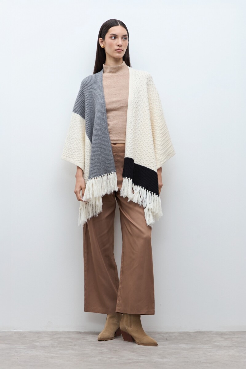 Ruana color block con flecos crudo